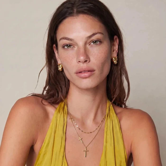 Divine Layers Cross Necklace Set in gold-tone metal, with fine layered chains and three graduated cross pendants