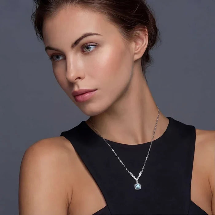 Celestial Arc Moissanite Necklace with a fine silver-tone chain and square blue pendant framed by sparkling accents