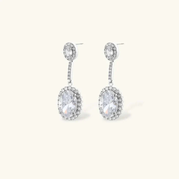 Celestial Cascade CZ Necklace set featuring silver-tone drop earrings with clear oval cubic zirconia stones and pavé halos