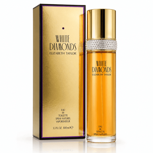 Elizabeth Taylor White Diamonds EDT Women perfume in a clear amber glass spray bottle with a gold cap and jeweled collar, beside a gold box