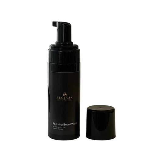 Foaming Beard Wash in a black pump bottle with a matching cap, featuring a sleek cylindrical design and gold label