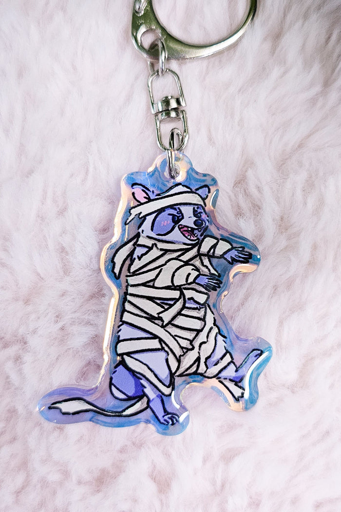 MYSTERY BAG Kuni the Raccoon Spooky Horror Iridescent Keychain Mystery Box/Keychain/Bag Charm - Koodle