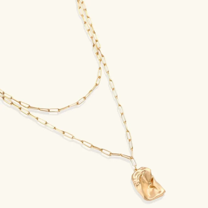 Molten Dreams Layered Paperclip Pendant Necklace with gold-tone links and an irregular, softly sculpted rectangular pendant