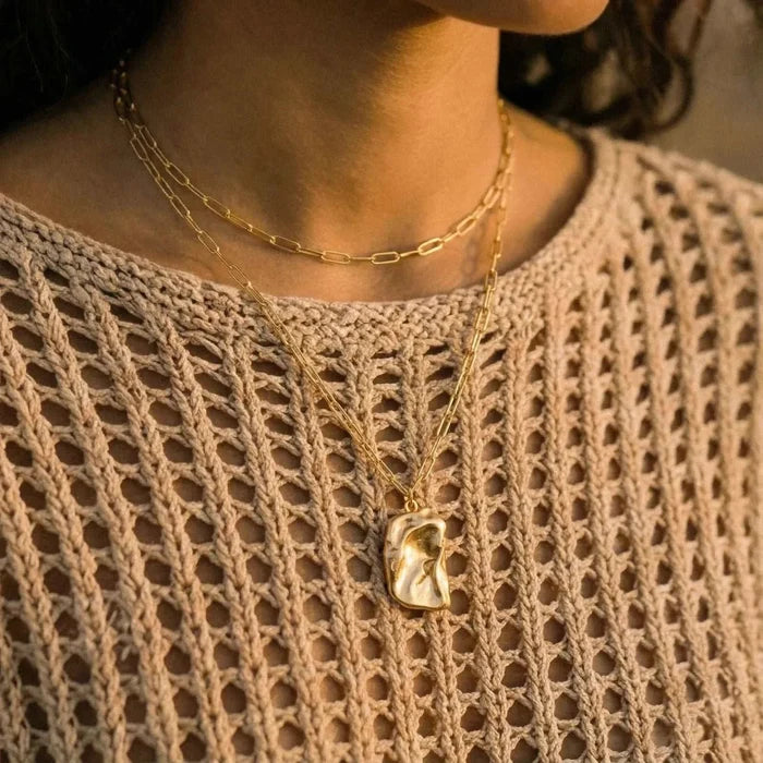 Molten Dreams Layered Paperclip Pendant Necklace with two gold-tone chains and a sculpted, crumpled rectangular pendant