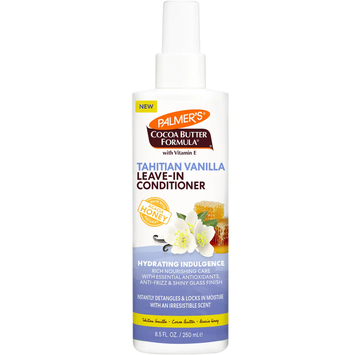 A bottle of Palmer's Cocoa Butter Formula Leave-In Conditioner in Tahitian Vanilla scent, featuring a white bottle with a spray top, a blue and yellow label, and illustrations of vanilla flowers and honeycomb.