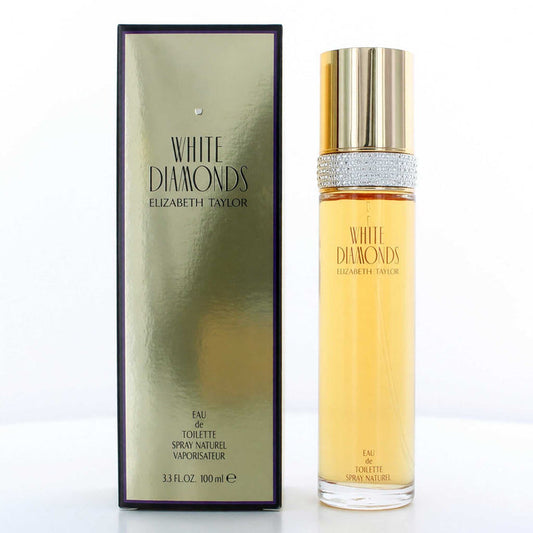 White Diamonds by Elizabeth Taylor EDT spray in a clear glass bottle with golden perfume, jeweled collar and matching gold box
